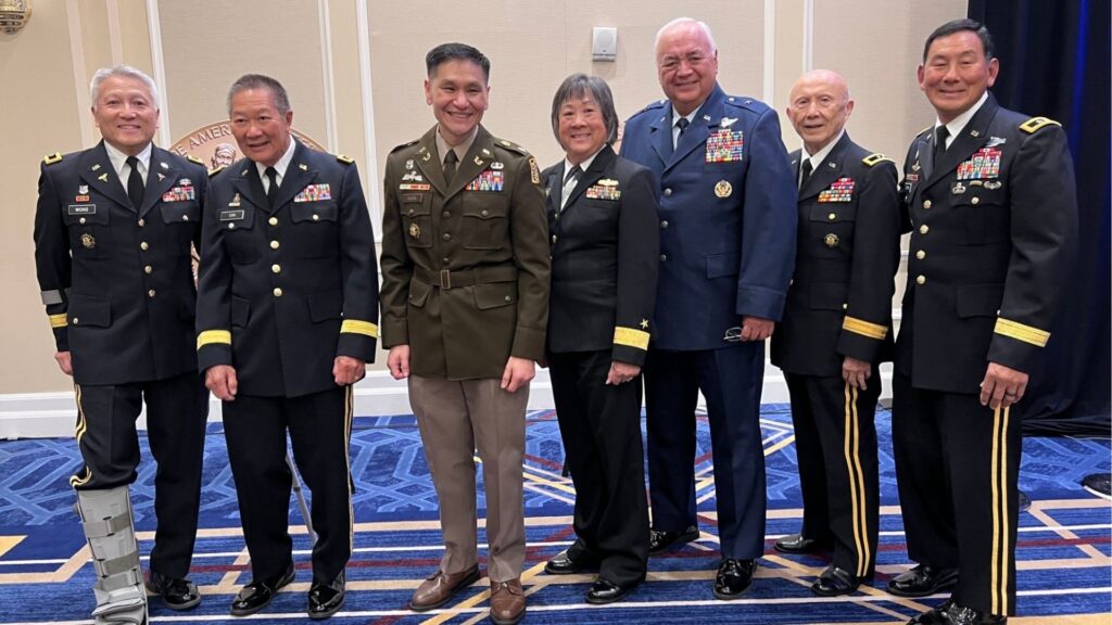 Military officials posing for a photo