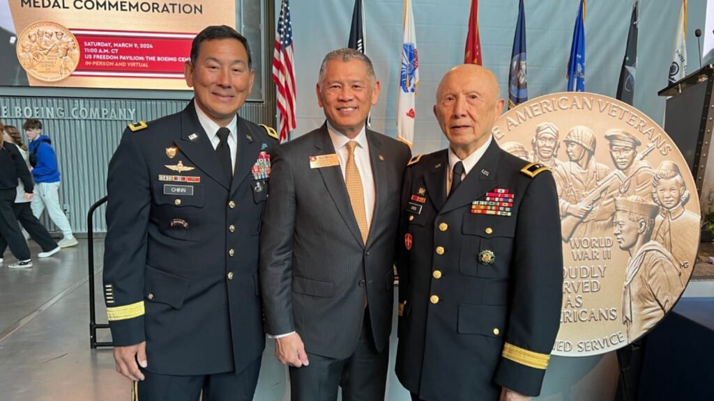 Military officials pose for a photo