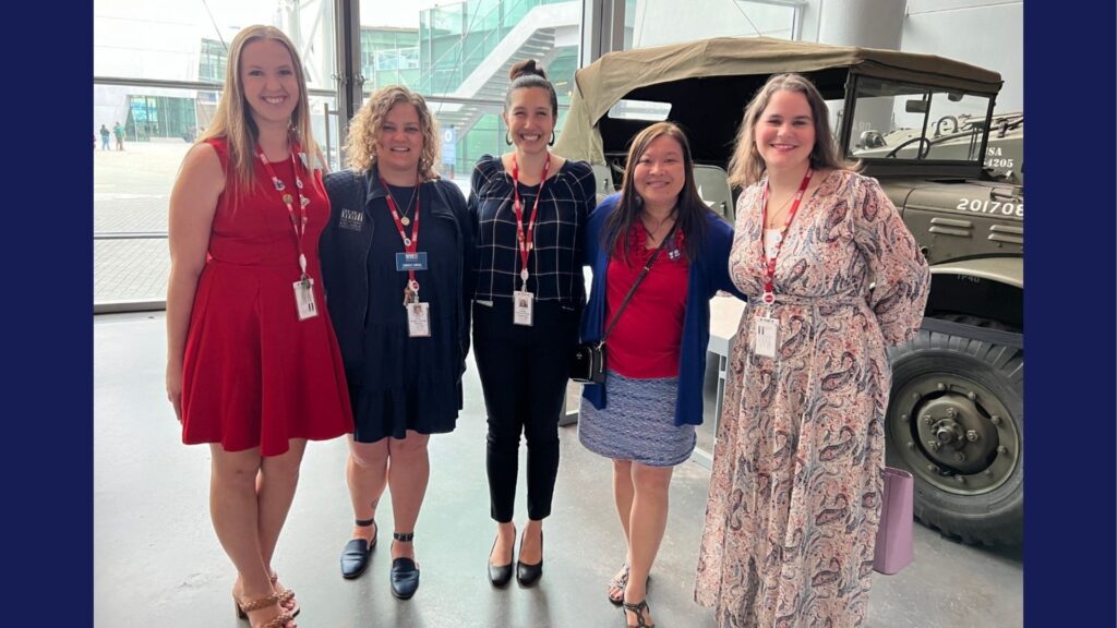 Group photo of museum staff with Grace Leo