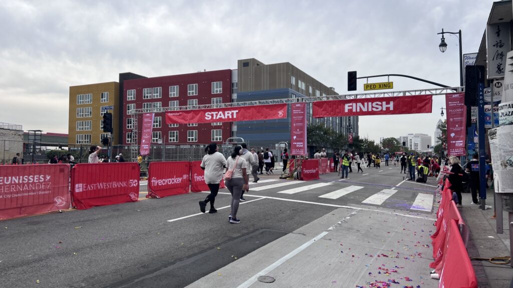 Runners approaching the finish line at the Firecracker Run