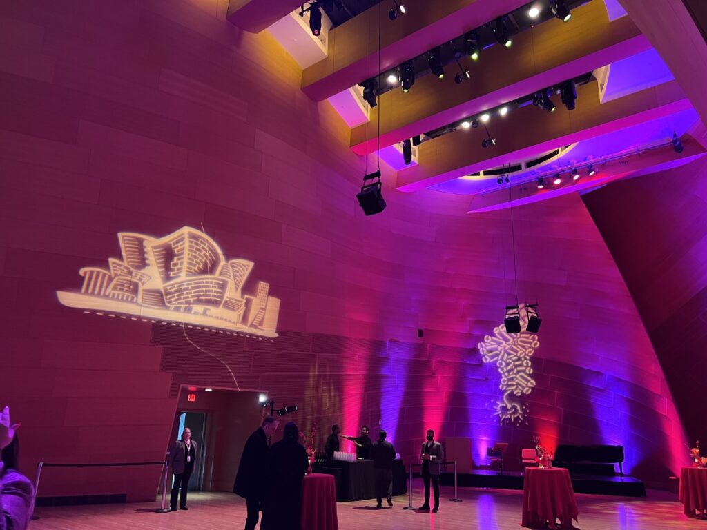 Photo of BP Hall showing skylight and images projected on the walls